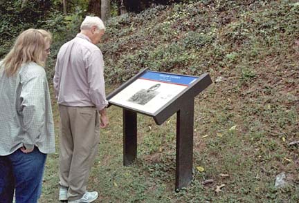 People reading sign